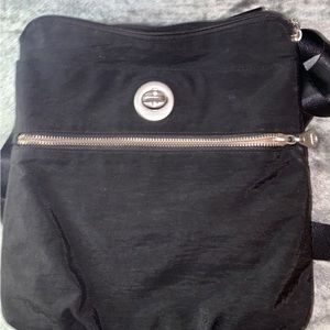 Two barely used like new cross body bags